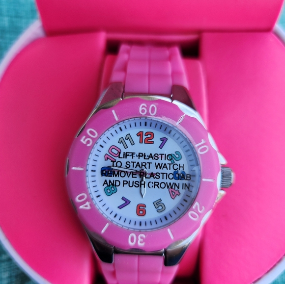 Issac Mizrahi LIVE pink watch with colorful numbers. - Picture 1 of 5
